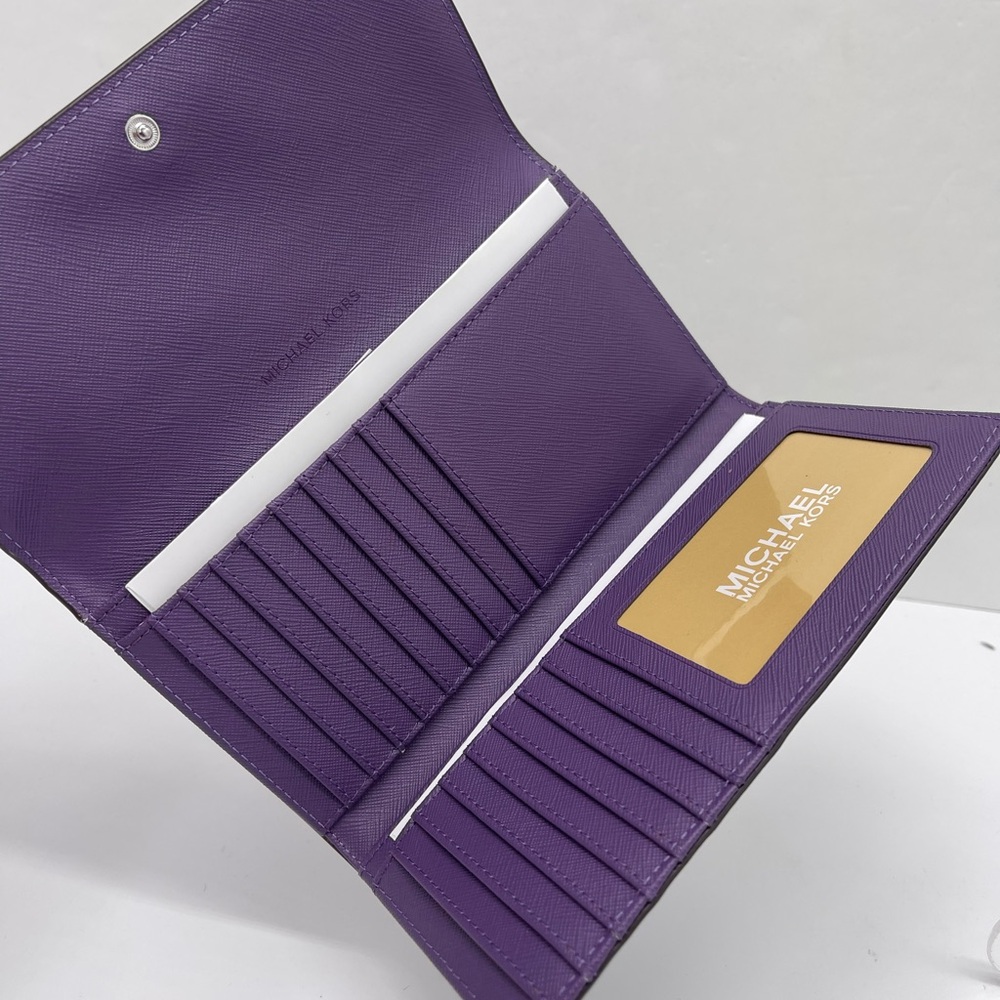 Michael Kors Lg Jet Set Travel Trifold Leather Wallet 
Dark Purple 
NWT - Picture 15 of 16